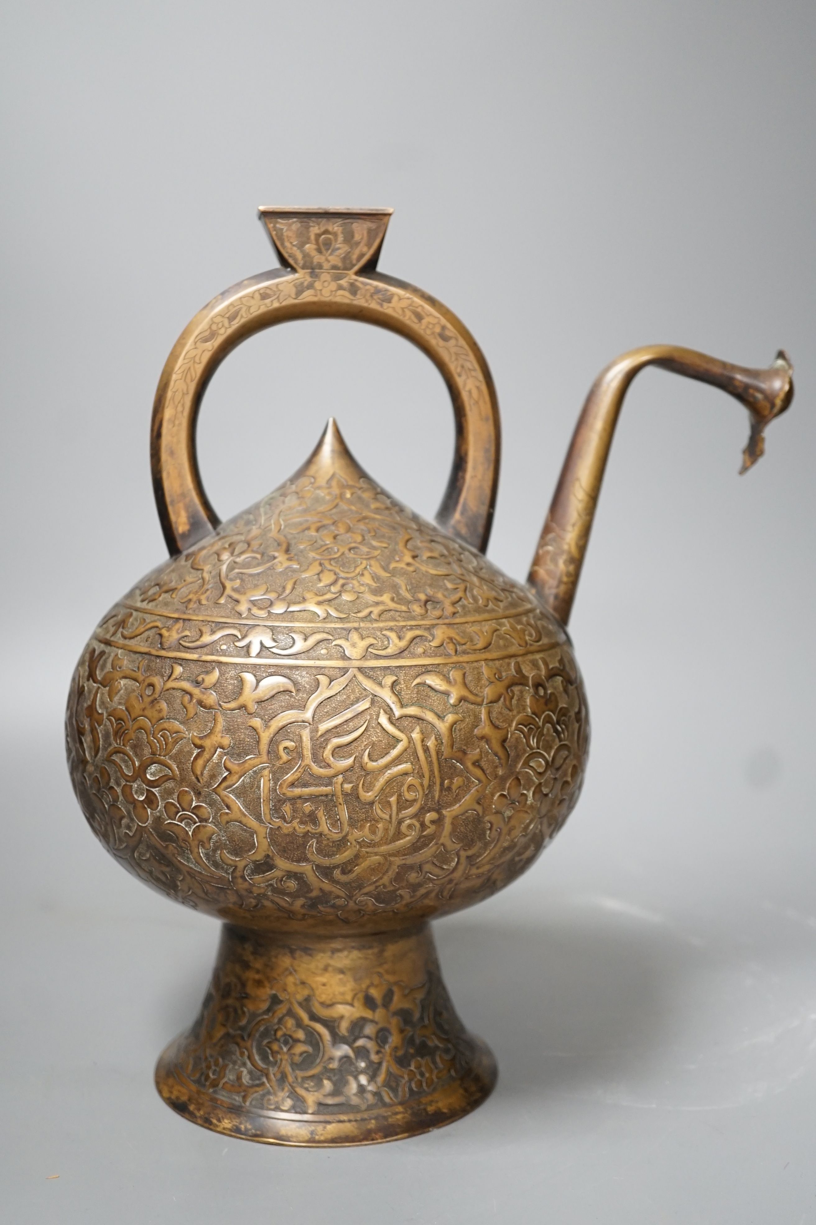 A 19th century Turkish bronze boza ewer - 30cm high